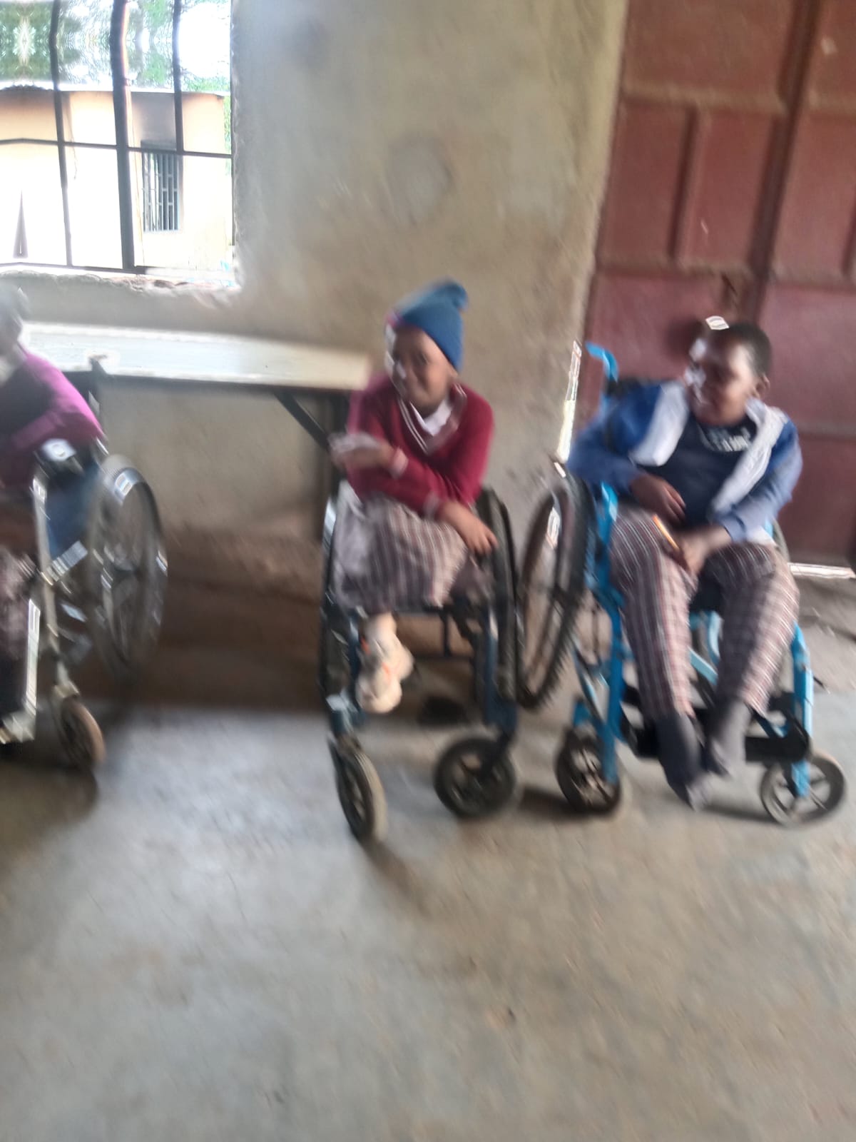 Special needs children sitting in their wheelchair 